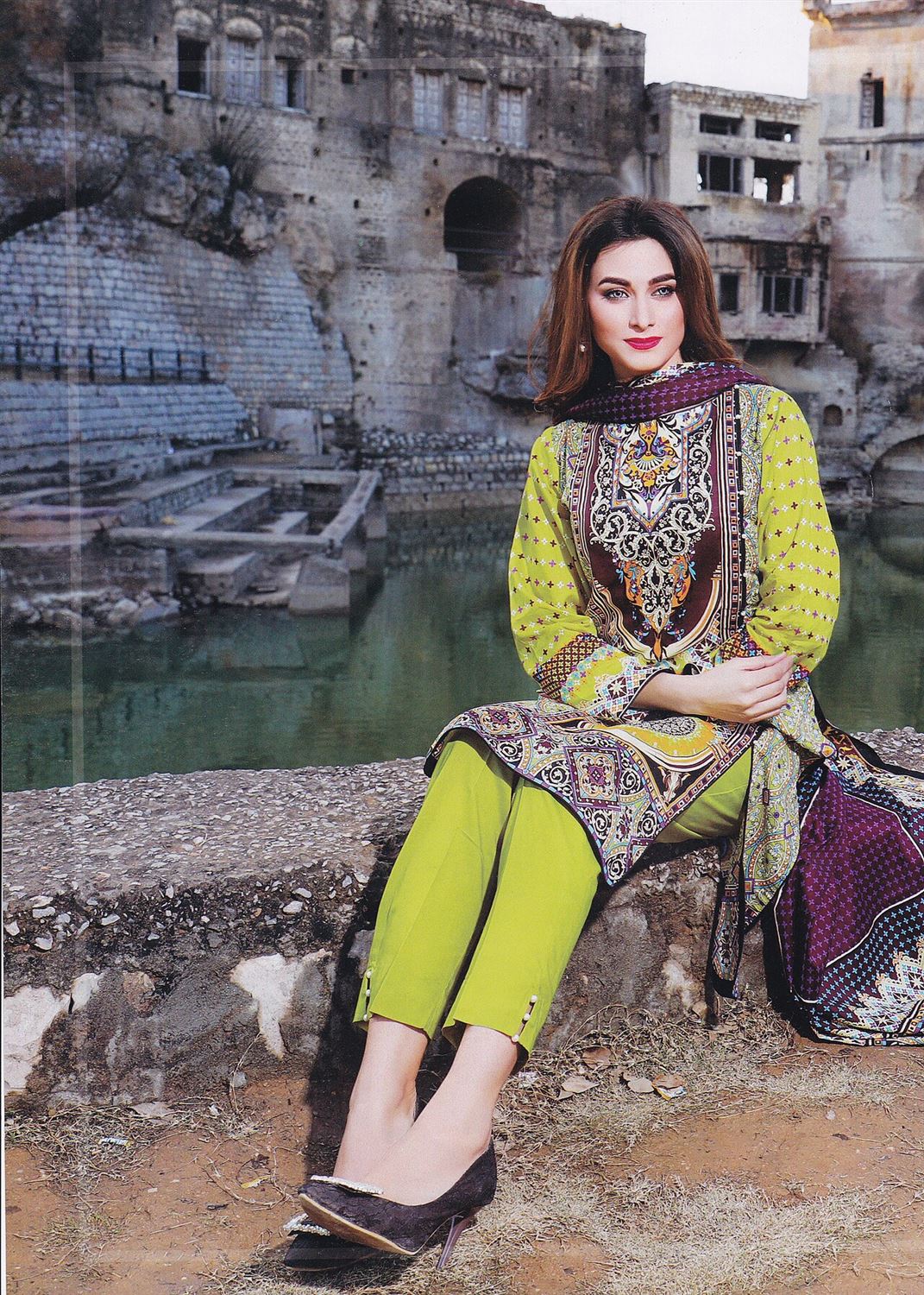 Woman in an embroidered Pakistani shalwar kameez with dupatta